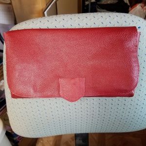red leather clutch purse